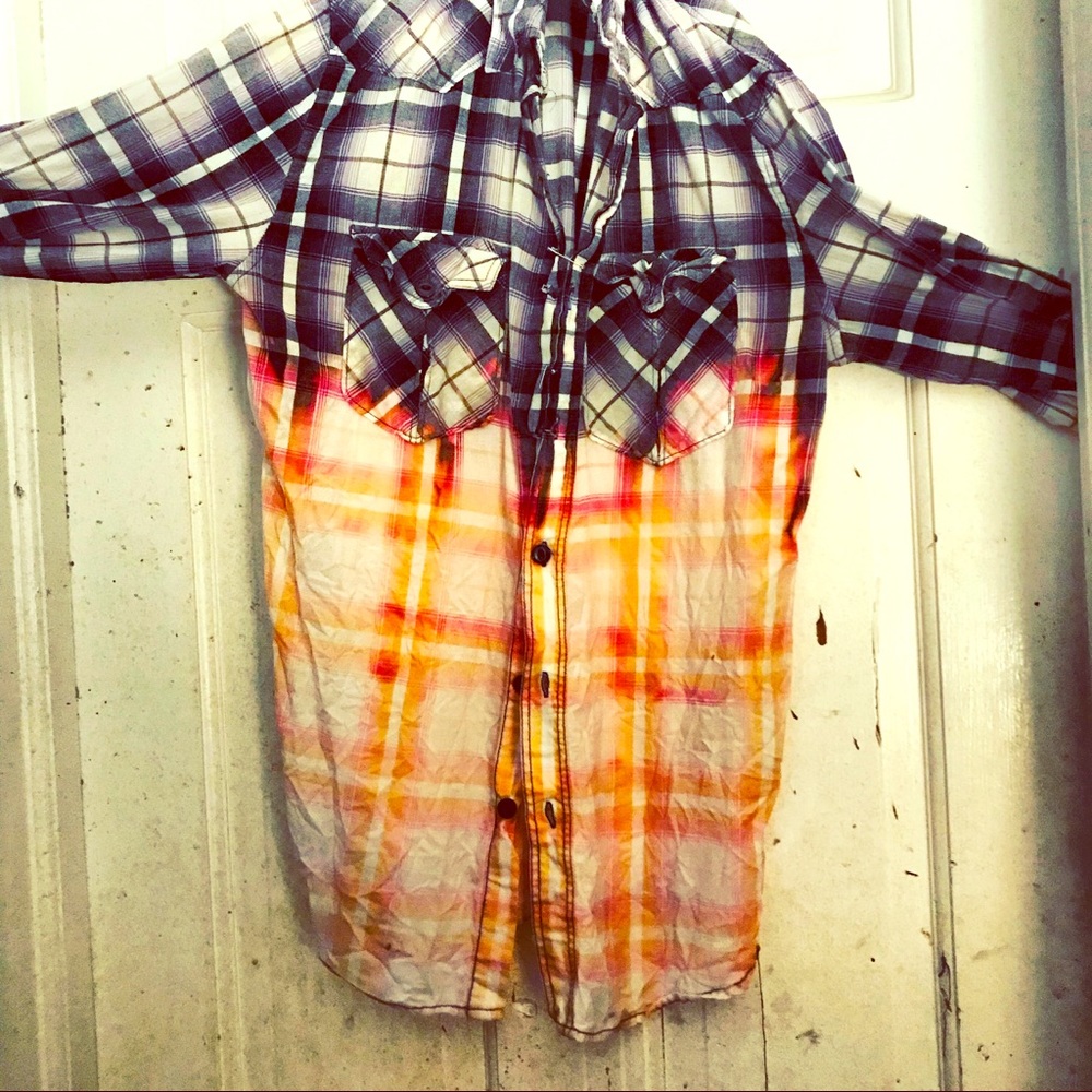 A bleached out Flannel from the chest down.